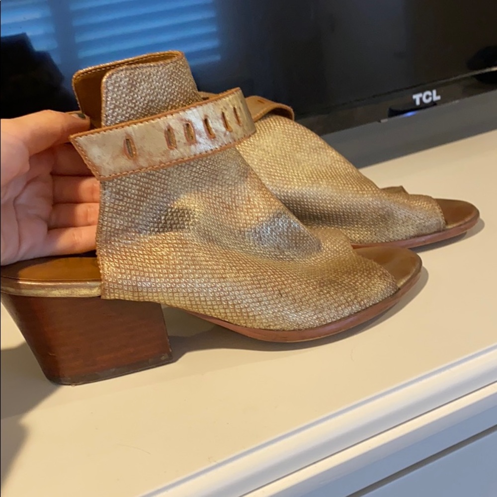 Gold sandal open toe booties.